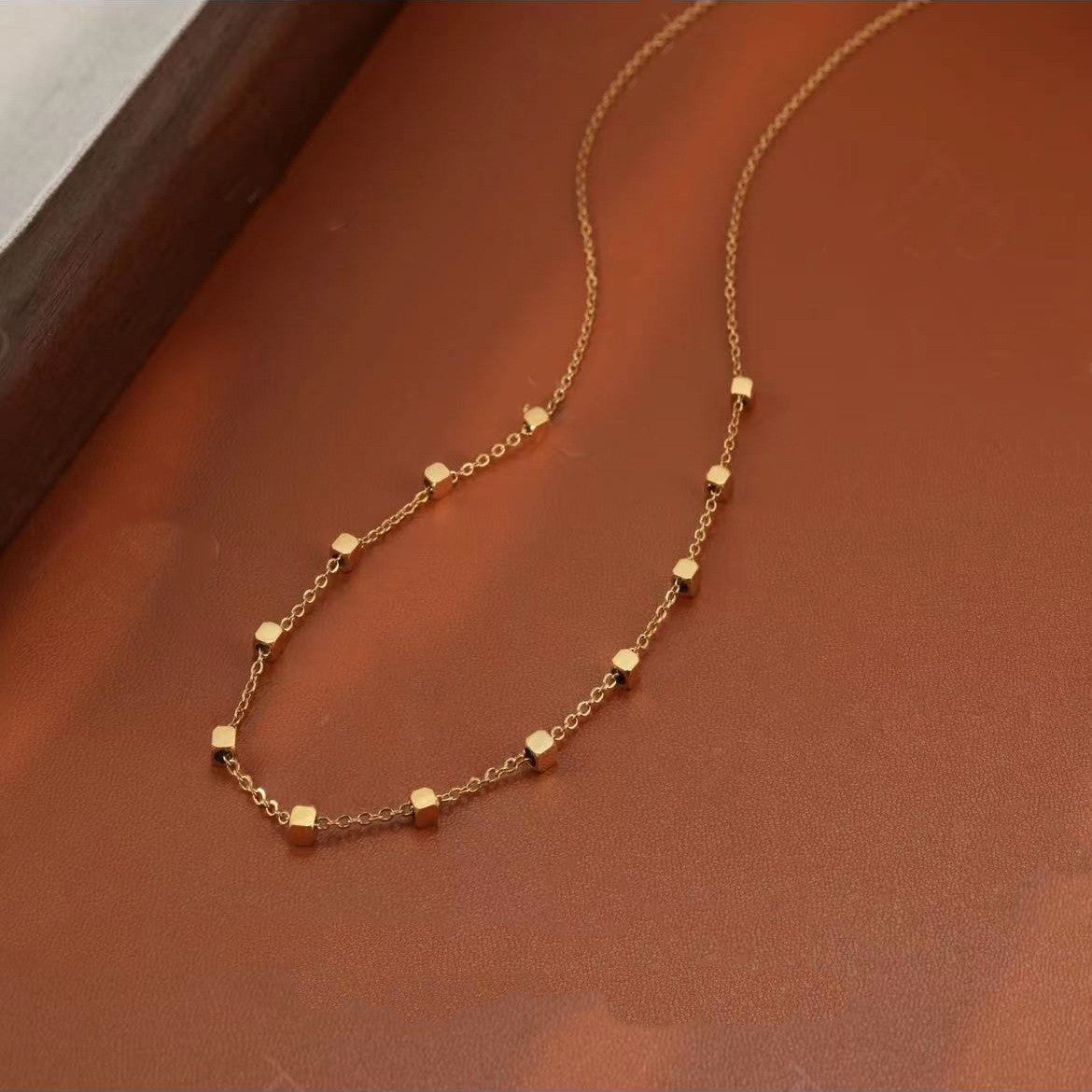 Golden Square Necklace – Minimalist Spark of Elegance