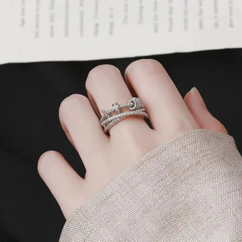 Grace in Motion – Zircon Cross Fidget Ring for Calm, Strength & Sparkle silver front