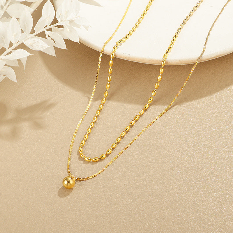 Golden Double-Layer Necklace – Minimalist Glow of Grace