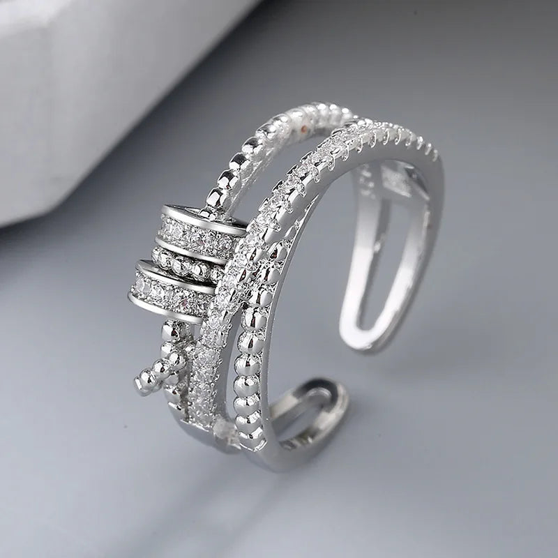 Grace in Motion – Zircon Cross Fidget Ring for Calm, Strength & Sparkle silver full