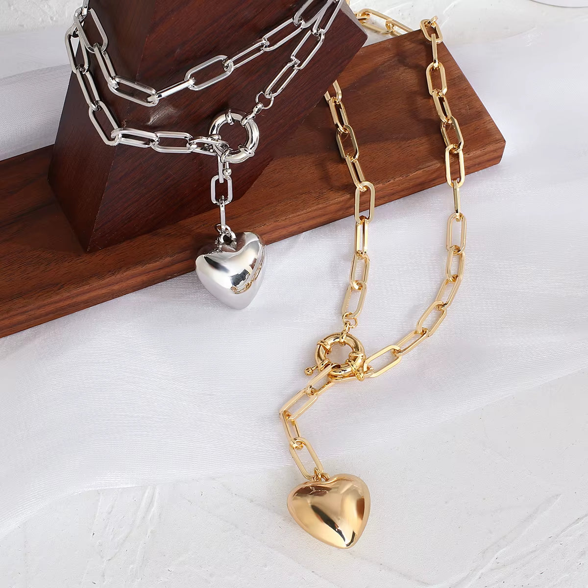 Bold Love in Golden Embrace – Statement Heart Necklace