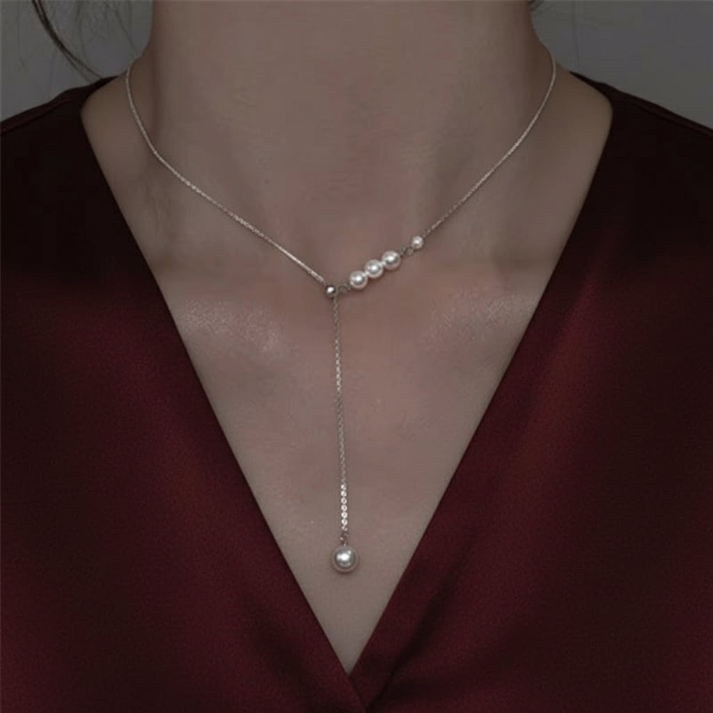 Sterling Grace – Long Chain Pearl Pendant Necklace